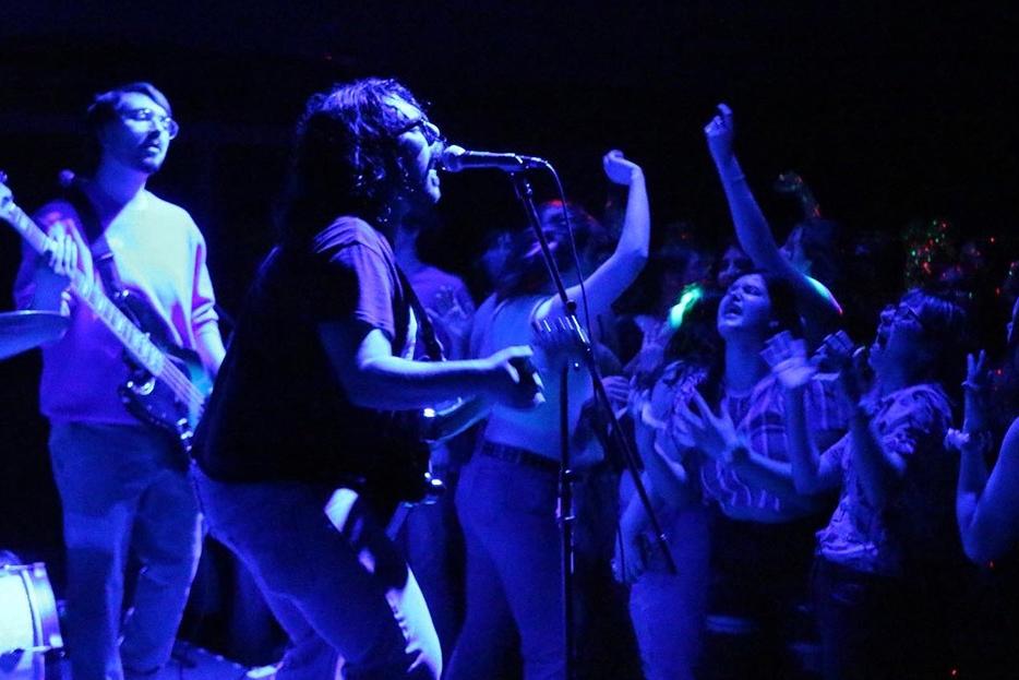 Students dance to the croon of a guest Indie Rock band.